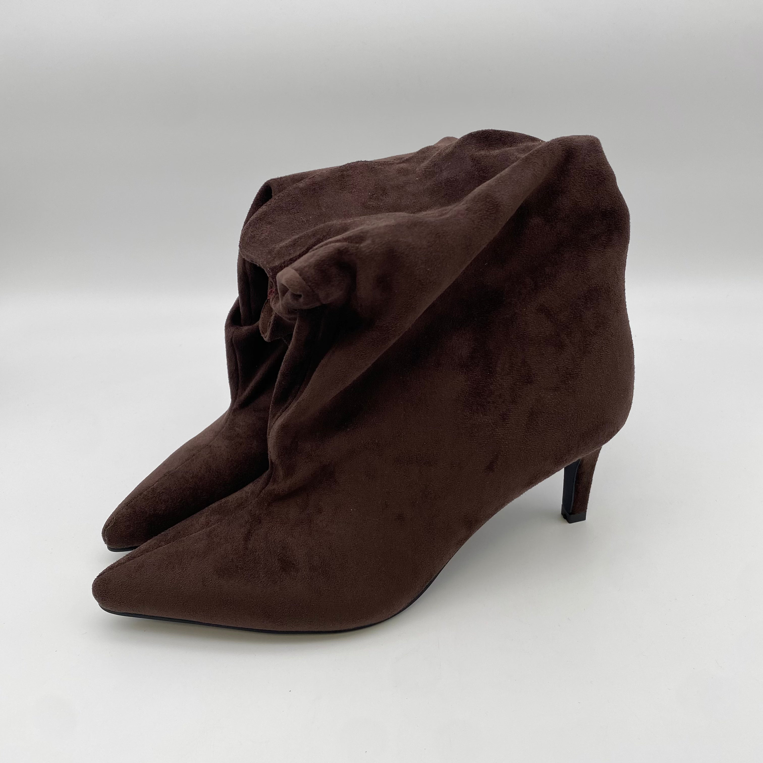 Pointy Boots Sued