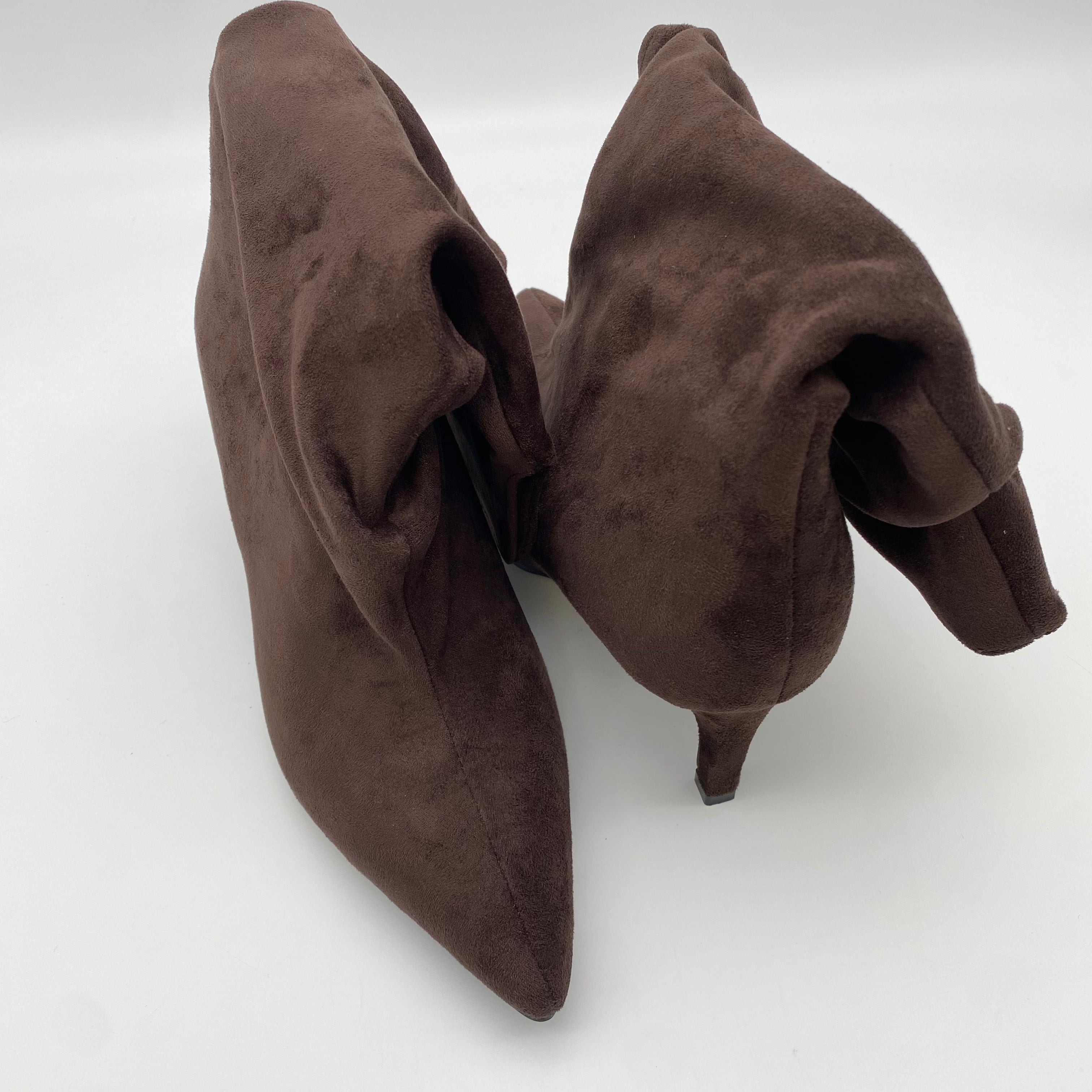 Pointy Boots Sued